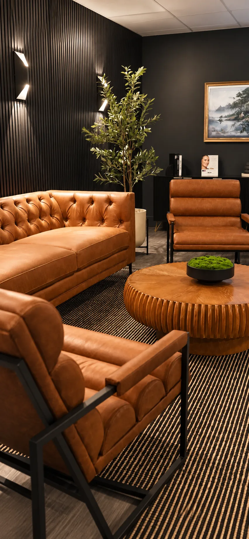 Patient lounge with leather seating at Evolve