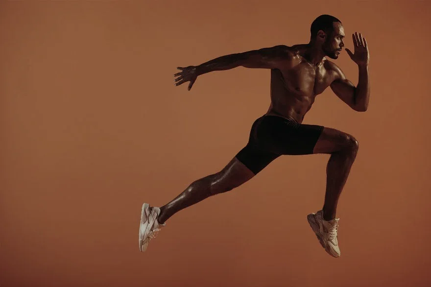 Athlete sprinting mid-stride