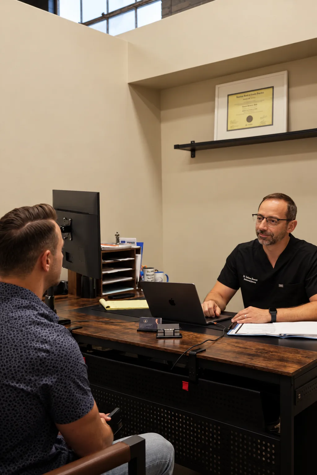 Dr. Dejan Slavnić consulting with a patient